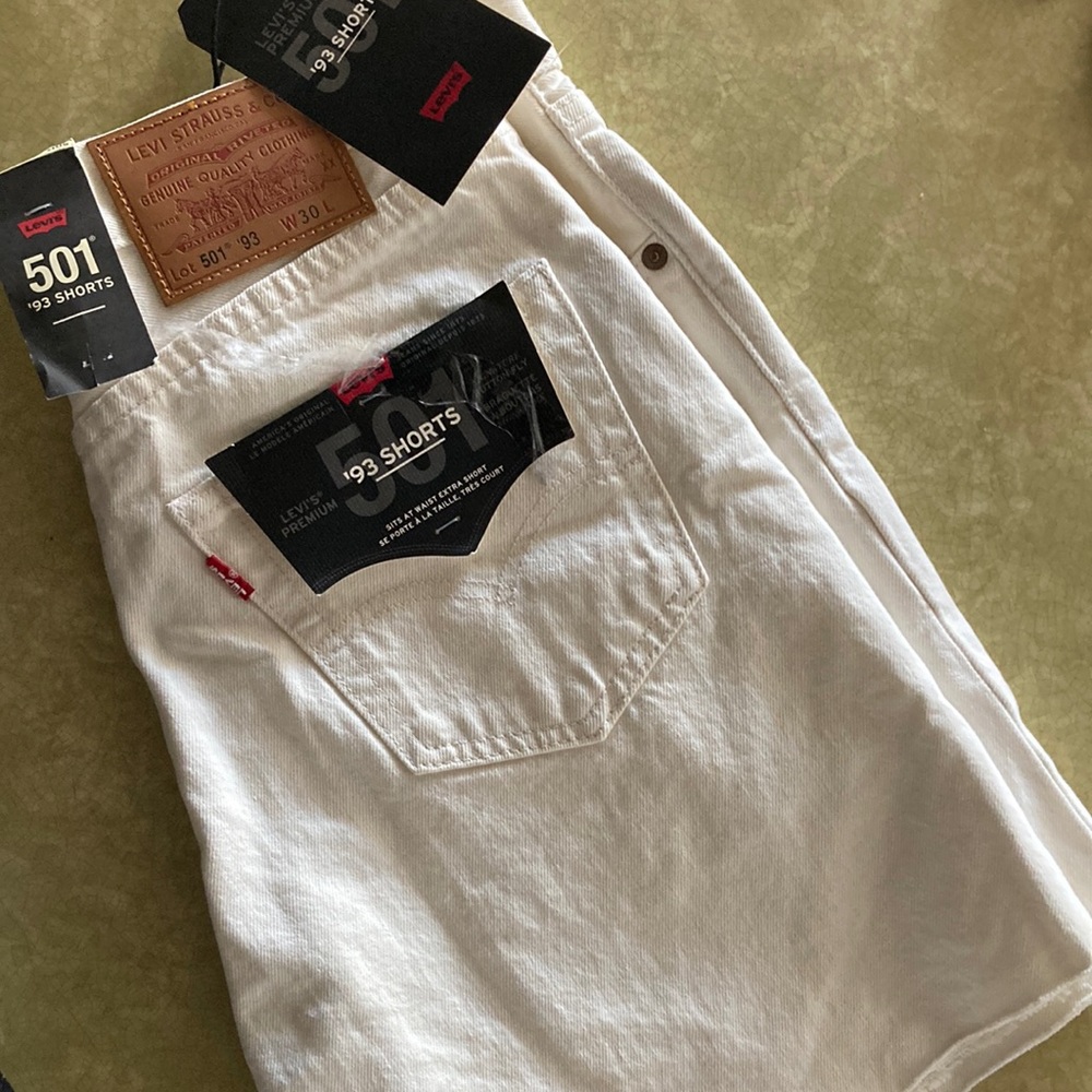 Levi’s white button fly cutoffs: size 30 fit small original 501..